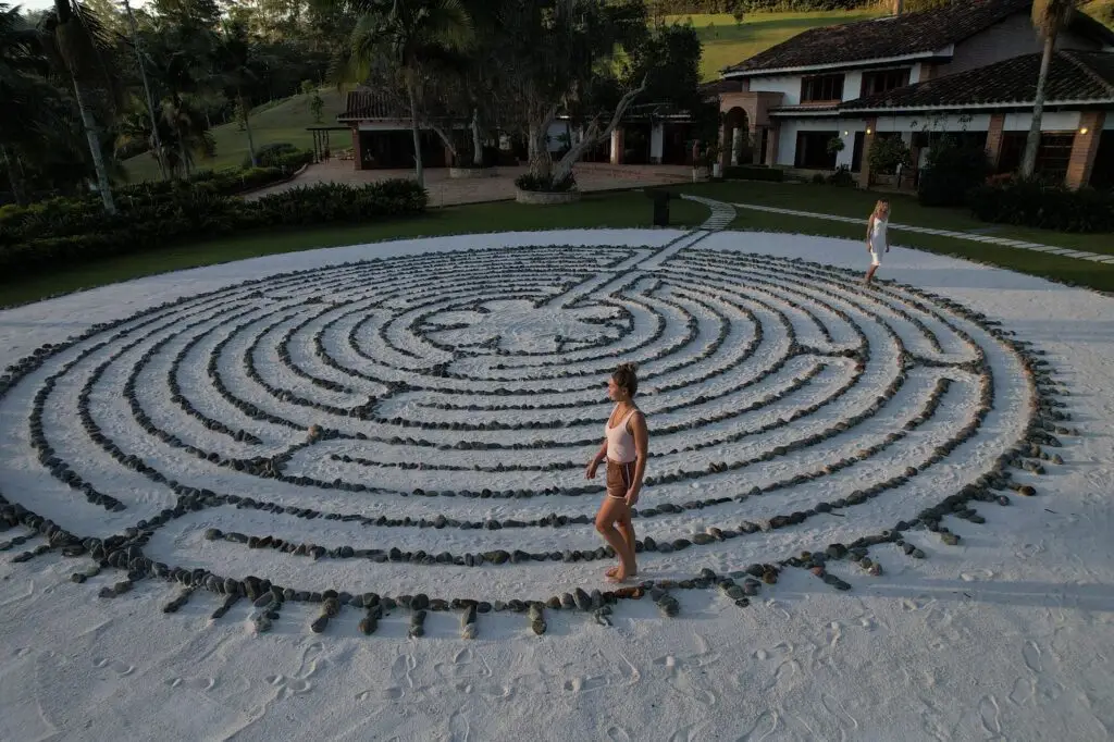 A guest walking the stone labyrinth