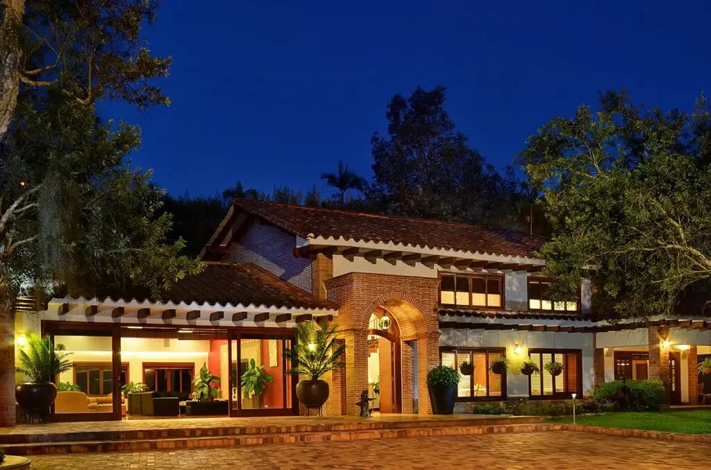 The main house lit up at night